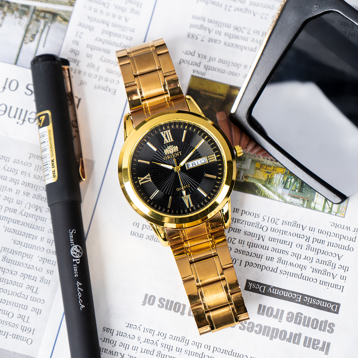 ساعت مچی Orient طلایی صفحه مشکی مدل Z20