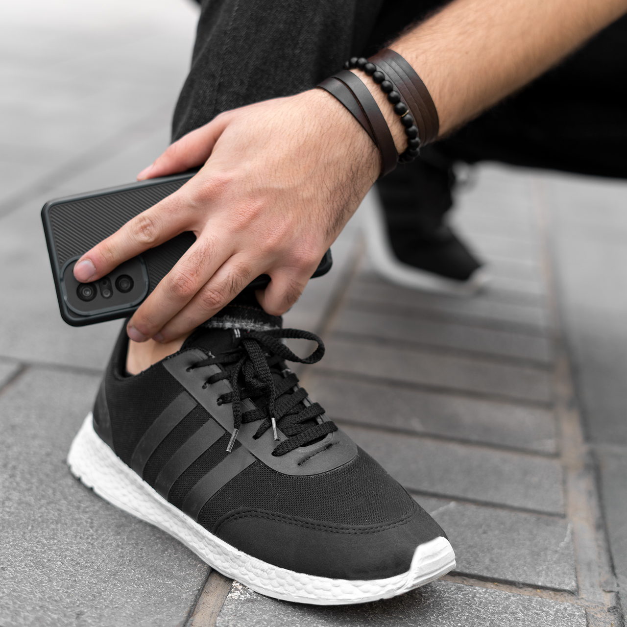 کفش ورزشی آدیداس مردانه مشکی زیره سفید مدل Hami