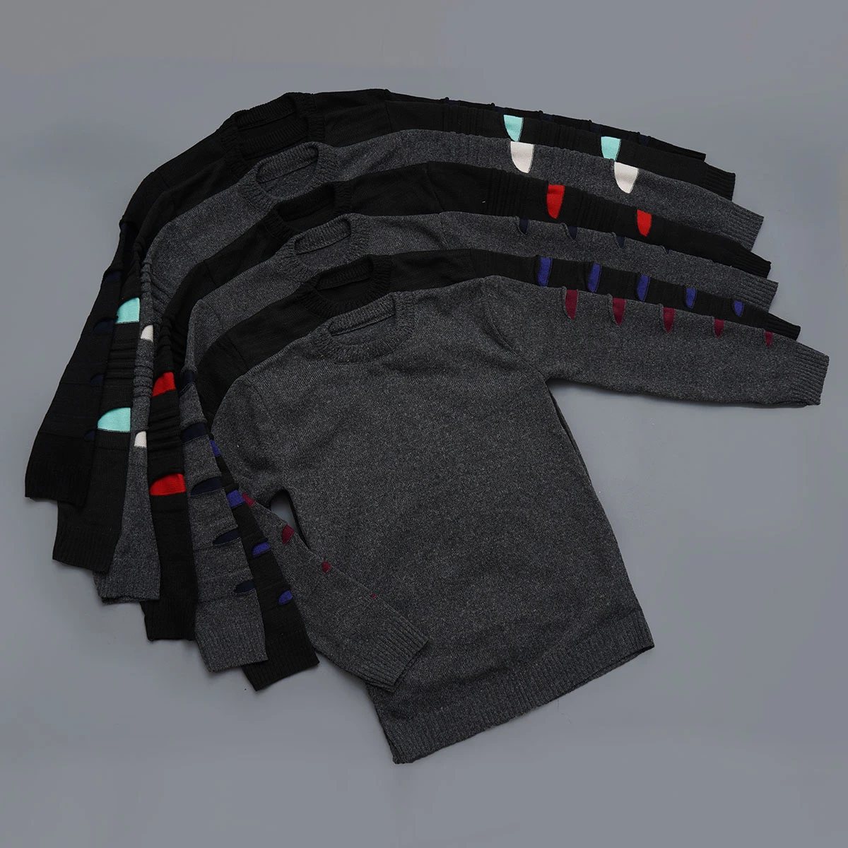 پلیور مردانه مشکی زاپ فیروزه ای مدل solan