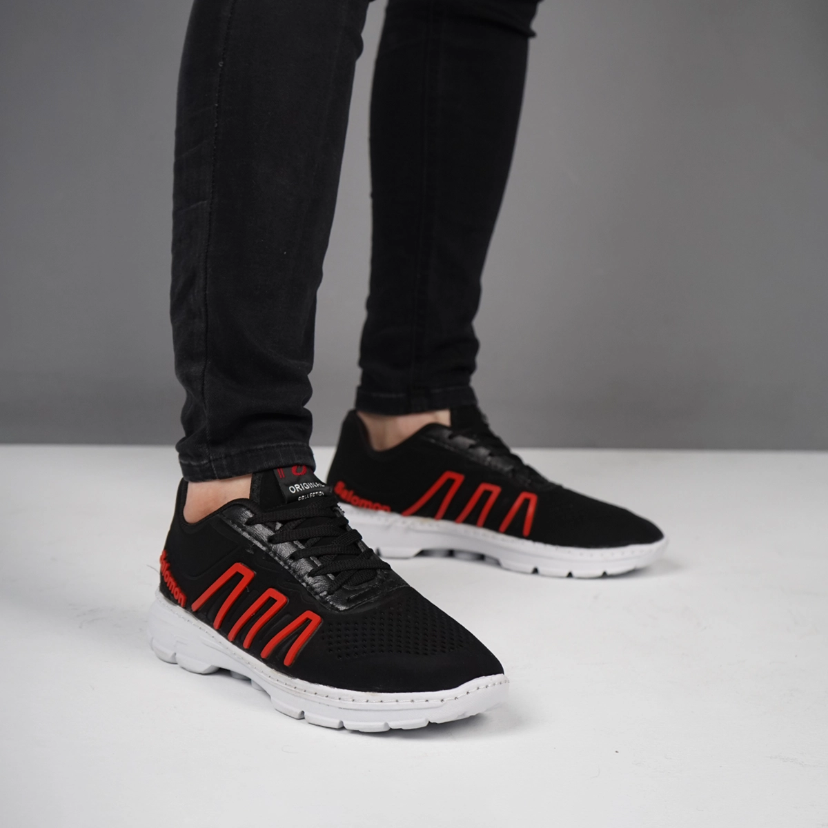 کفش ورزشی مردانه سالامون مشکی قرمز مدل U200