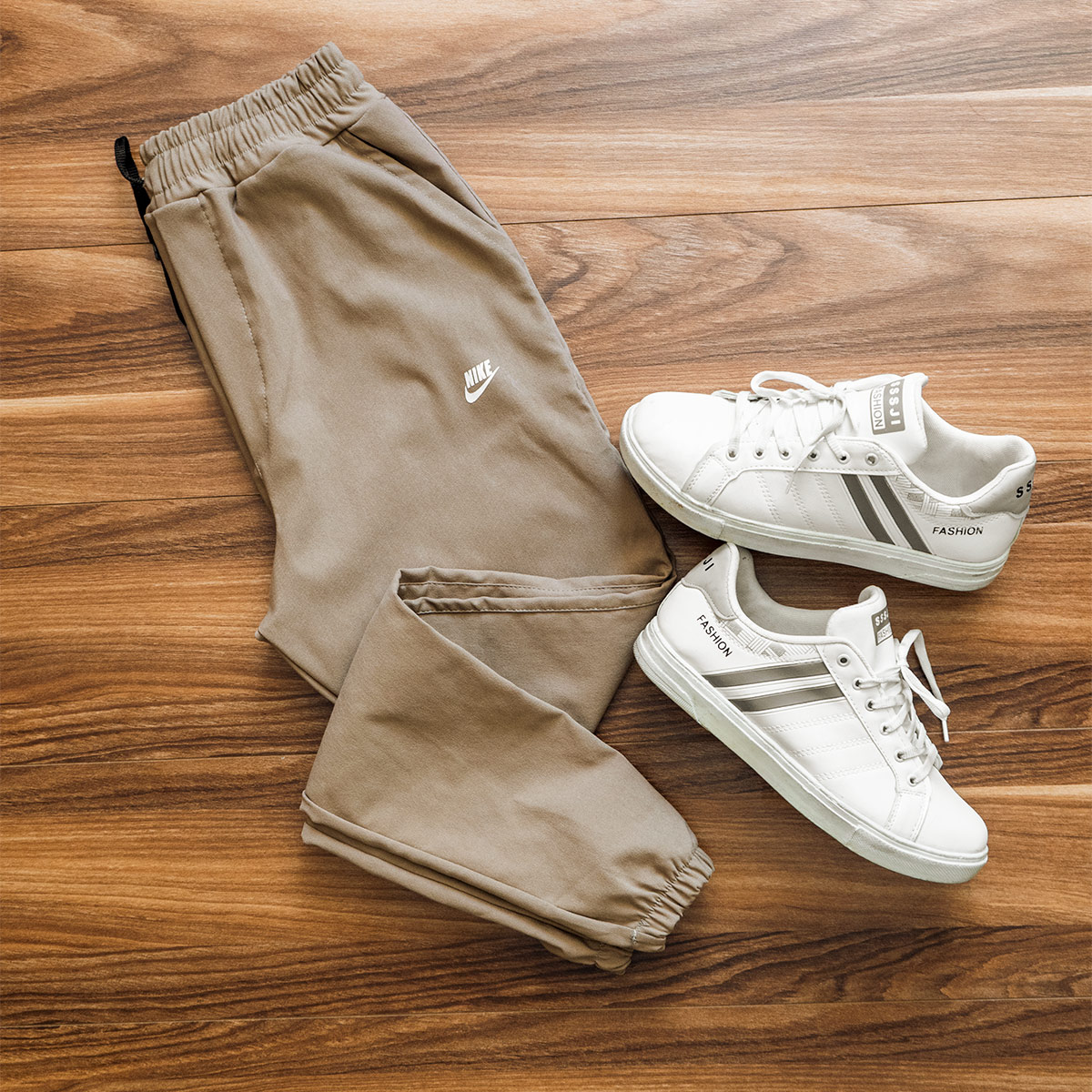 شلوار اسلش Nike کرم مردانه مدلLango